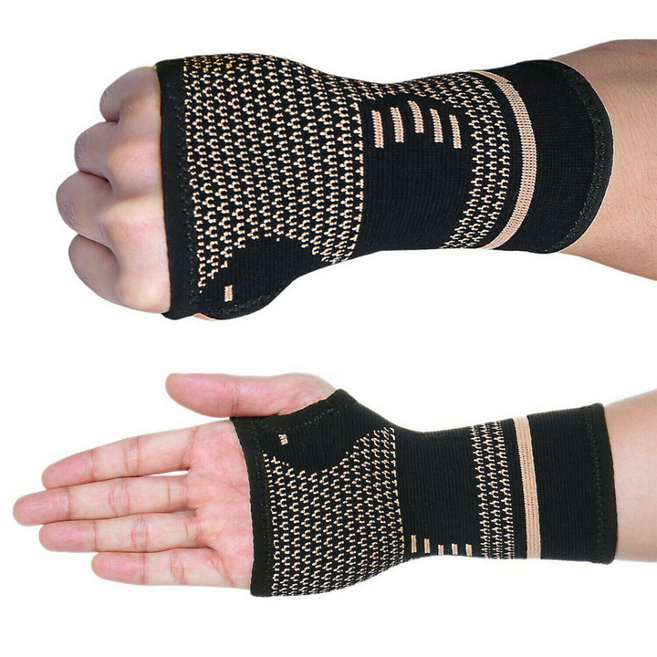 Unisex copper wrist and hand compression brace in sleek black, offering ergonomic support and pain relief for enhanced mobili