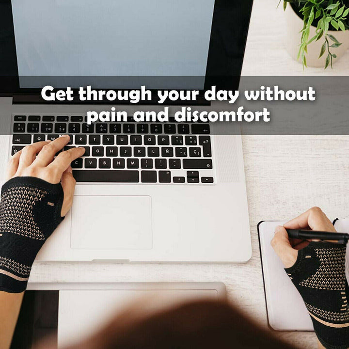 Unisex copper wrist and hand compression brace in sleek black, offering ergonomic support and pain relief for enhanced mobili
