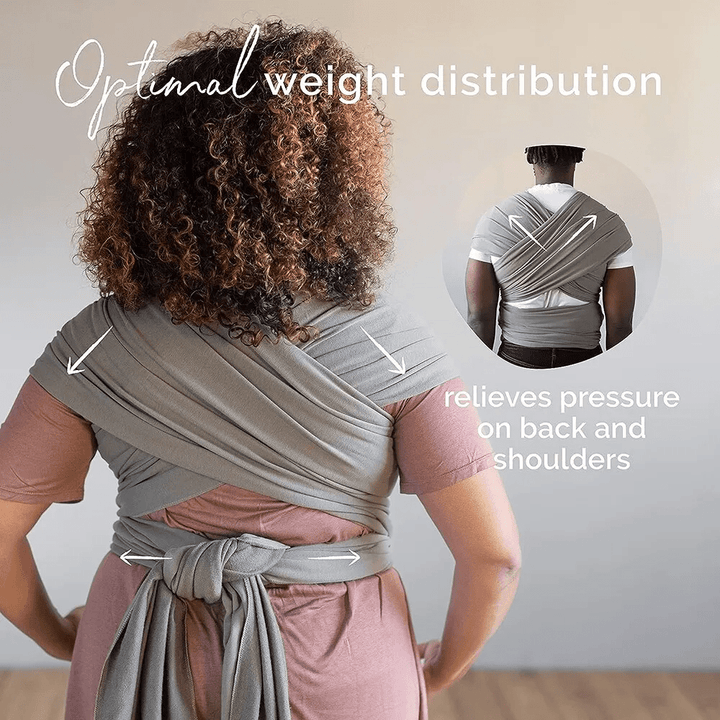 "Unisex ergonomic baby wrap carrier, grey, enveloping baby and parent comfortably for hands-free convenience."