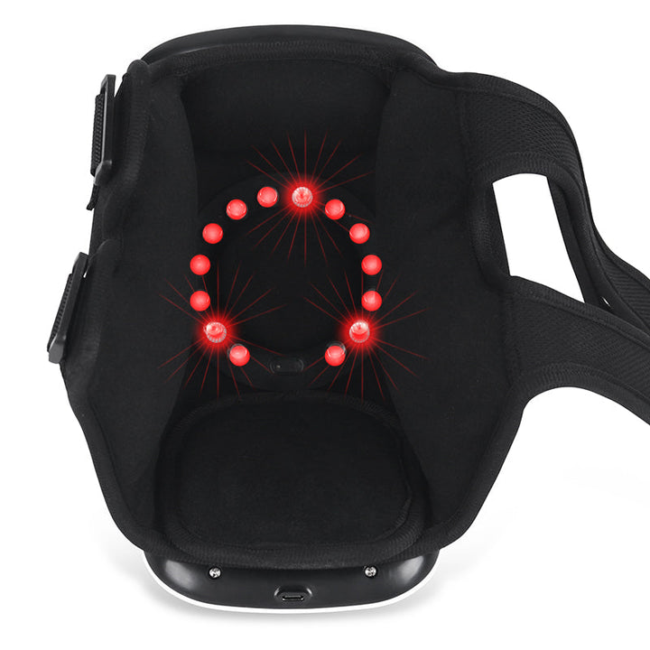 "Unisex knee relief massager with heat therapy for pain relief, featuring compact design, black and adjustable straps."
