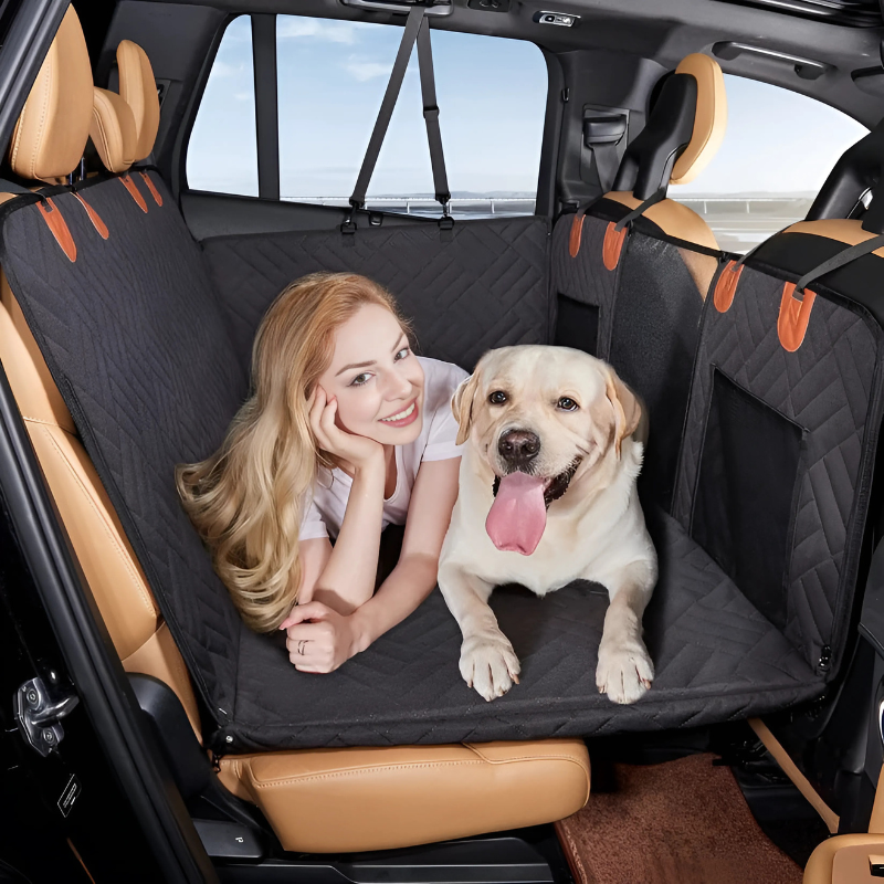 Waterproof pet car seat cover with non-slip design for dogs, providing plush comfort and protection in backseat.