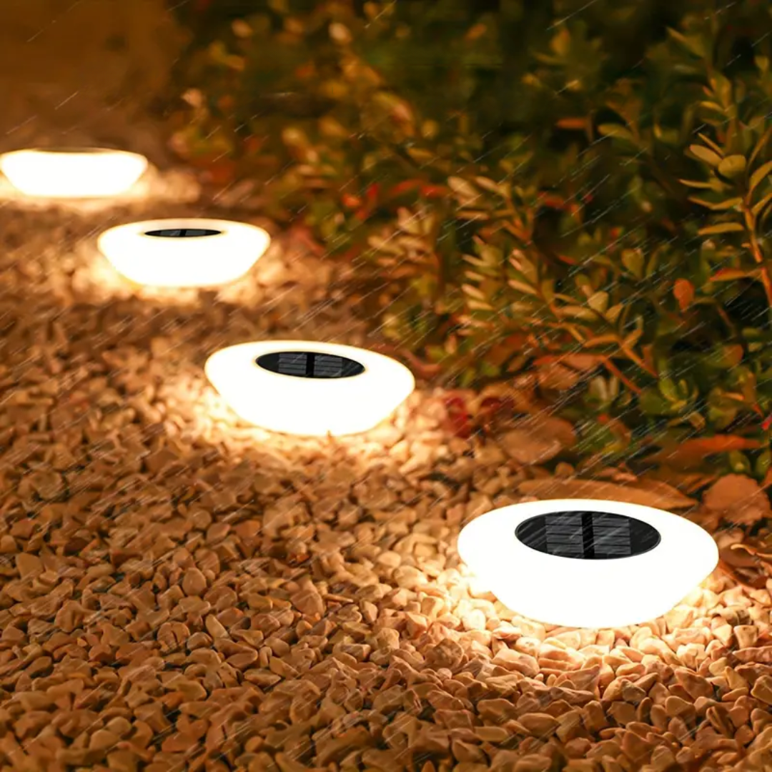 Weatherproof solar outdoor garden light, rust-proof ABS, warm white glow, IP65-rated, eco-friendly and durable design.