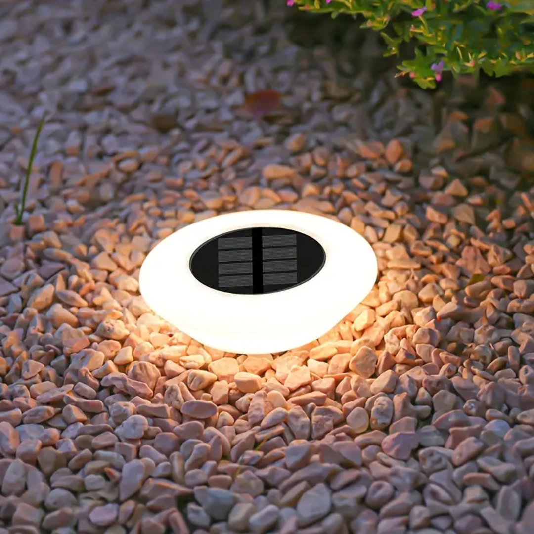 Weatherproof solar outdoor garden light, rust-proof ABS, warm white glow, IP65-rated, eco-friendly and durable design.
