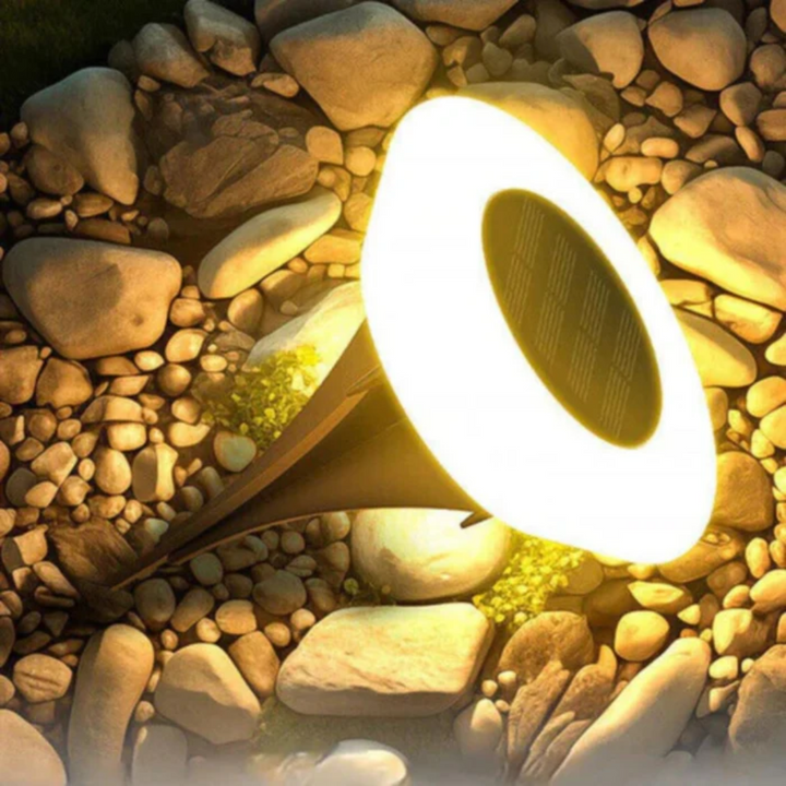 Weatherproof solar outdoor garden light, rust-proof ABS, warm white glow, IP65-rated, eco-friendly and durable design.