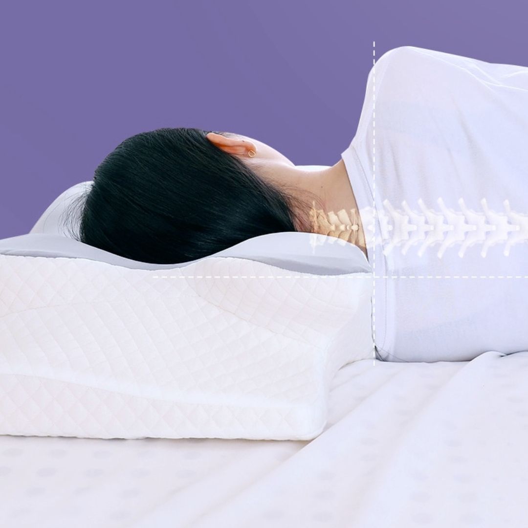 "White memory foam neck & shoulder relief pillow with ergonomic design, promoting comfort and pain relief for all sleepers."