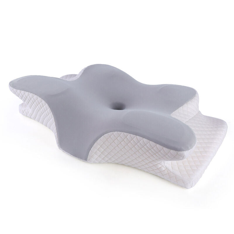 "White memory foam neck & shoulder relief pillow with ergonomic design, promoting comfort and pain relief for all sleepers."