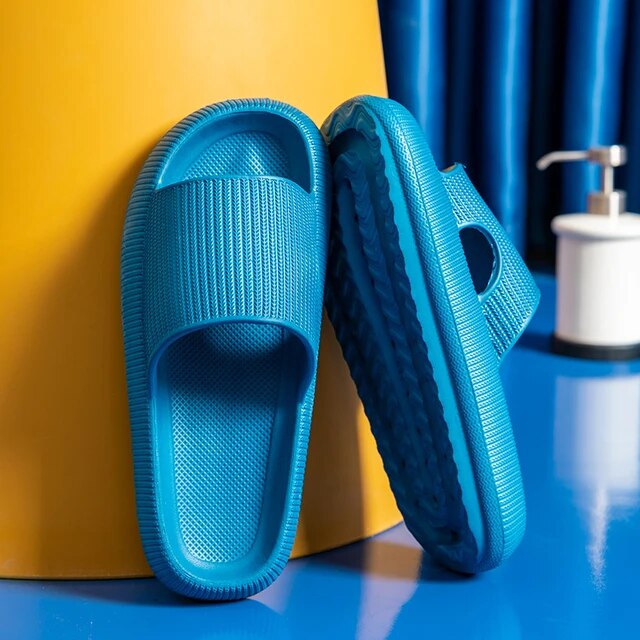 Women's Luxe Platform Cloud Slippers in vibrant hues with cushioned soles, non-slip design for indoor comfort and style.