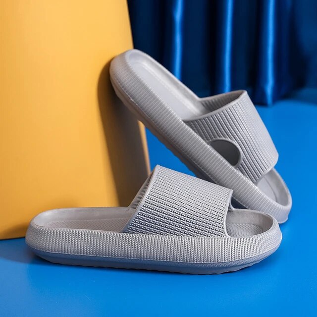 Women's Luxe Platform Cloud Slippers in vibrant hues with cushioned soles, non-slip design for indoor comfort and style.