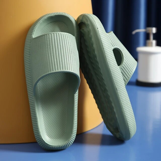 Women's Luxe Platform Cloud Slippers in vibrant hues with cushioned soles, non-slip design for indoor comfort and style.