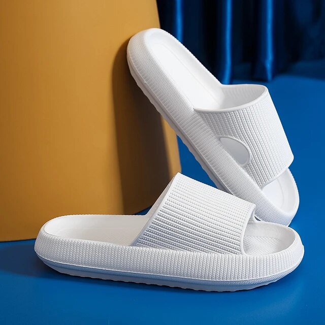 Women's Luxe Platform Cloud Slippers in vibrant hues with cushioned soles, non-slip design for indoor comfort and style.