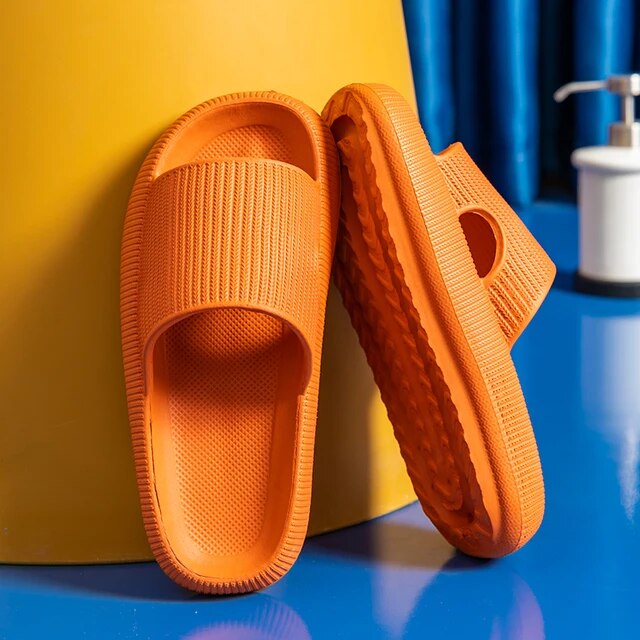 Women's Luxe Platform Cloud Slippers in vibrant hues with cushioned soles, non-slip design for indoor comfort and style.