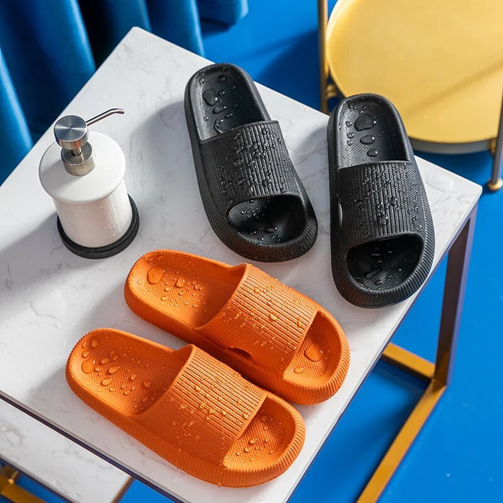Women's Luxe Platform Cloud Slippers in vibrant hues with cushioned soles, non-slip design for indoor comfort and style.