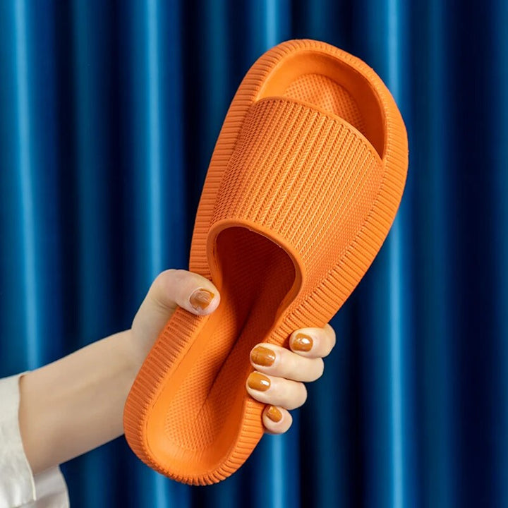 Women's Luxe Platform Cloud Slippers in vibrant hues with cushioned soles, non-slip design for indoor comfort and style.