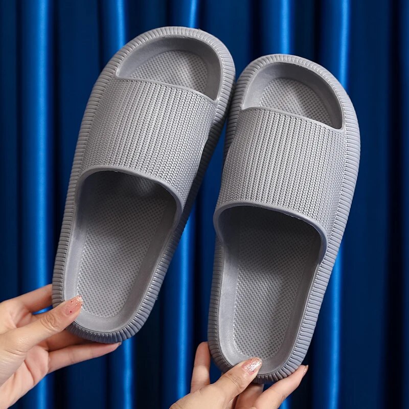 Women's Luxe Platform Cloud Slippers in vibrant hues with cushioned soles, non-slip design for indoor comfort and style.