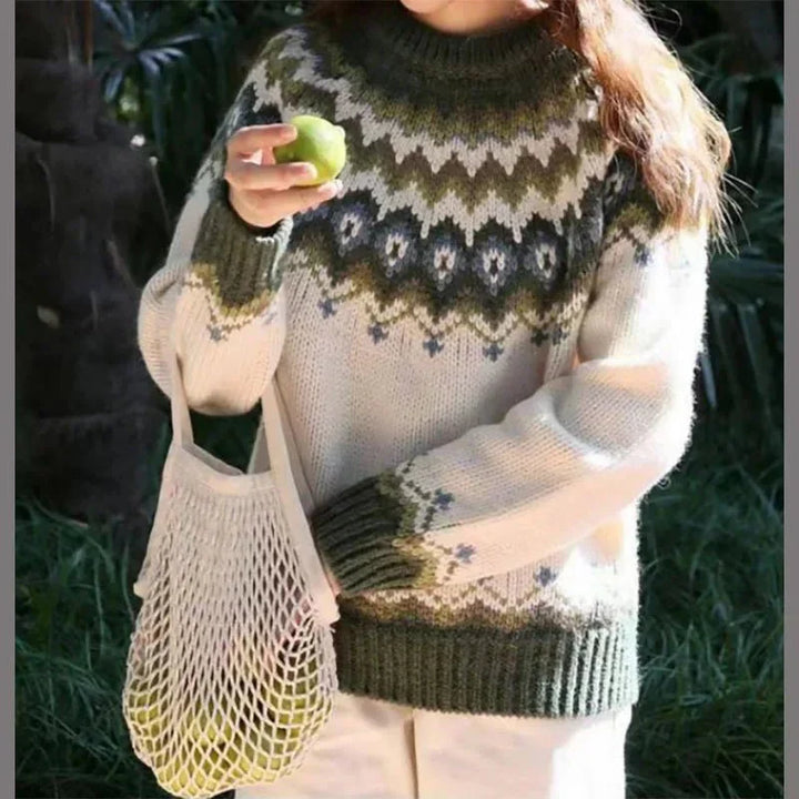 Women's all-season knit sweater with ribbed cuffs in a neutral color, featuring a classic silhouette for versatile style.