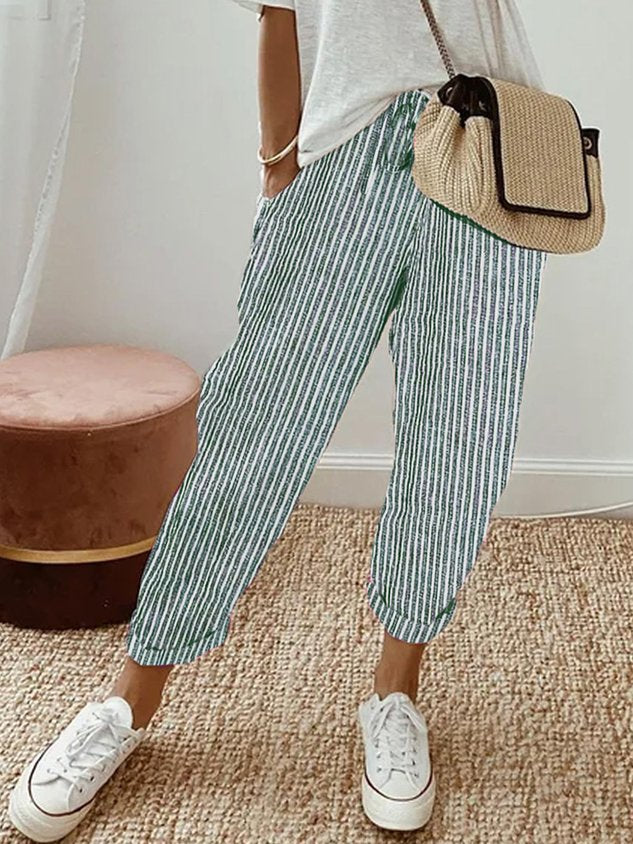 Women's breathable high-waist pants featuring a sleek silhouette, anti-sweat fabric, perfect for work and casual wear.