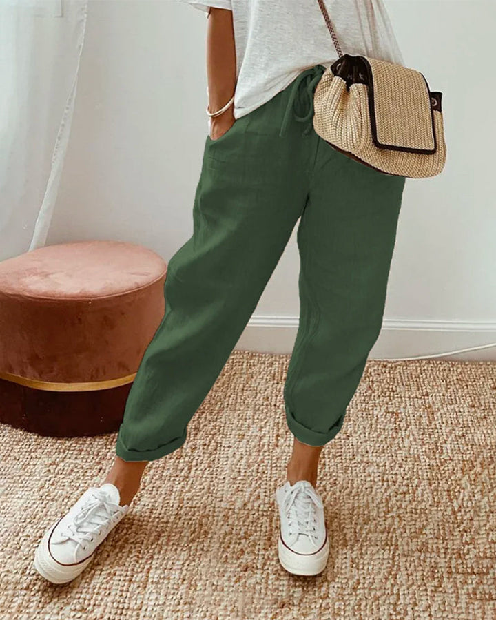 Women's breathable high-waist pants featuring a sleek silhouette, anti-sweat fabric, perfect for work and casual wear.