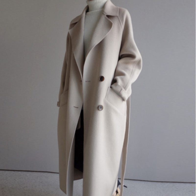 Women's casual wool jacket in beige with a refined cut and chic design, perfect for elegant winter style and warmth.