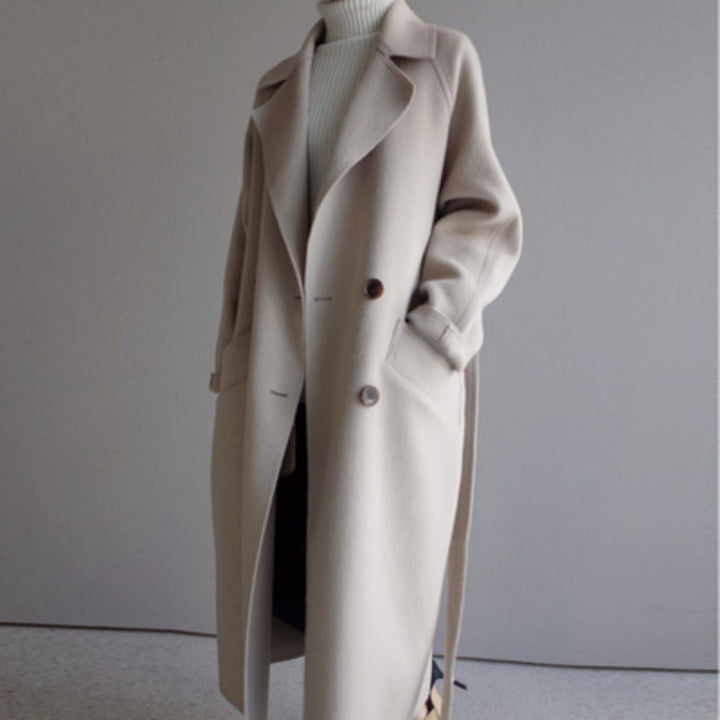 Women's casual wool jacket in beige with a refined cut and chic design, perfect for elegant winter style and warmth.