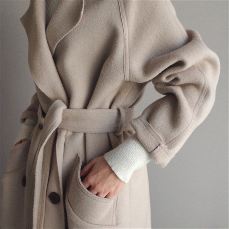 Women's casual wool jacket in beige with a refined cut and chic design, perfect for elegant winter style and warmth.