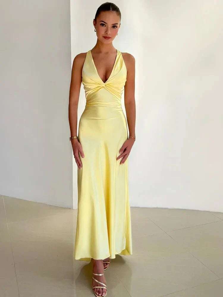 "Women's elegant sleeveless party dress, mid to mini length, flattering fit, perfect for special occasions and evening events