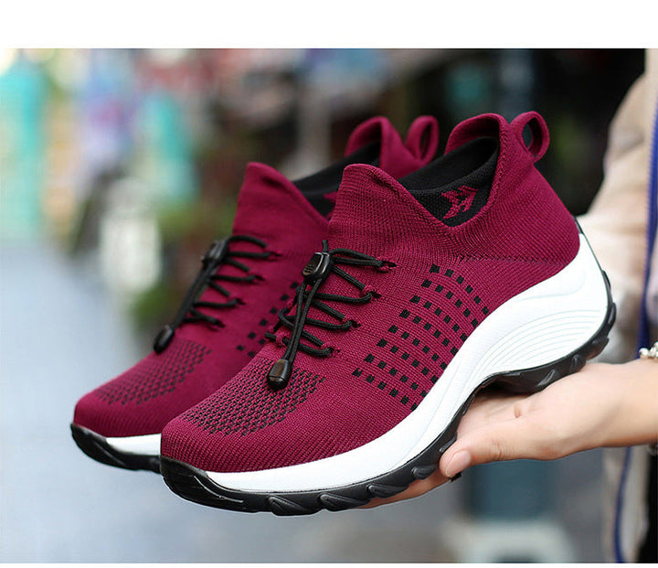 "Women's orthopaedic comfort shoes with contoured footbed, mesh upper in black and purple, providing advanced support."