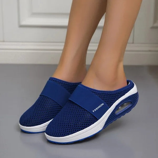 Close-up of the ergonomic cushioning inside the women's orthopedic breathable slippers.