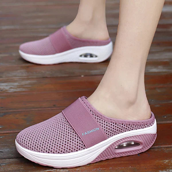 Women's orthopedic breathable slippers in blue, demonstrating their versatility for daily wear.