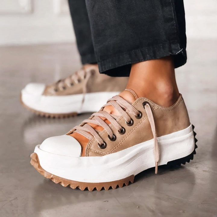 "Women's platform comfort sneakers with supportive sole, trendy design, breathable material in black, brown, white."