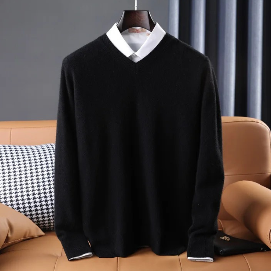 Women's premium cashmere V-neck sweater in soft pink, offering luxury and comfort with an elegant design.