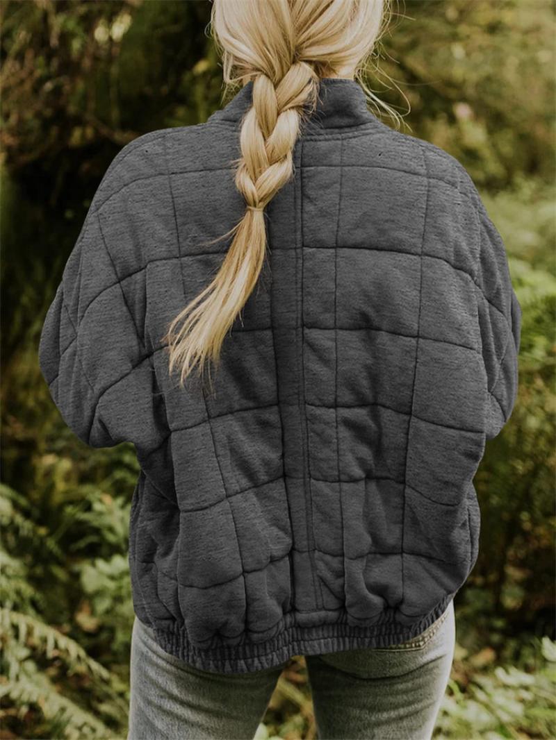 "Women's quilted jacket front view; classic design, versatile; visual texture with balanced warmth, perfect for layering."