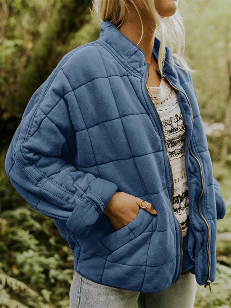 "Women's quilted jacket front view; classic design, versatile; visual texture with balanced warmth, perfect for layering."