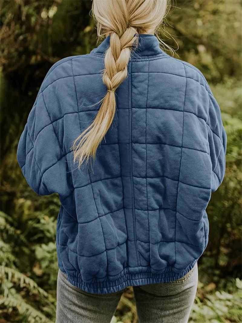 "Women's quilted jacket front view; classic design, versatile; visual texture with balanced warmth, perfect for layering."