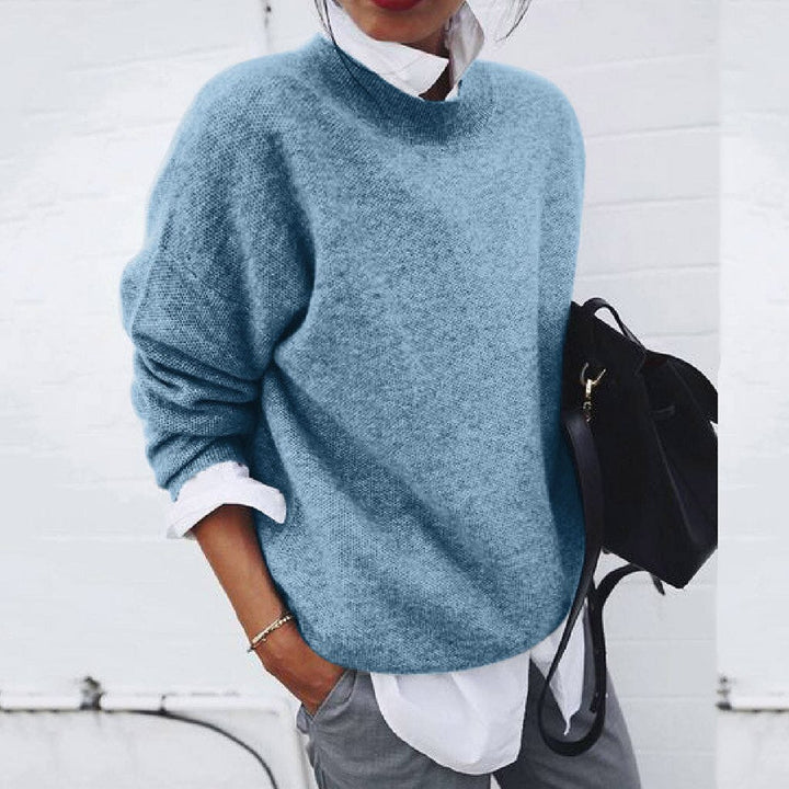 "Women's soft cashmere sweater, plush fabric, flattering fit, versatile style, shown in khaki, ideal for adding chic comfort.