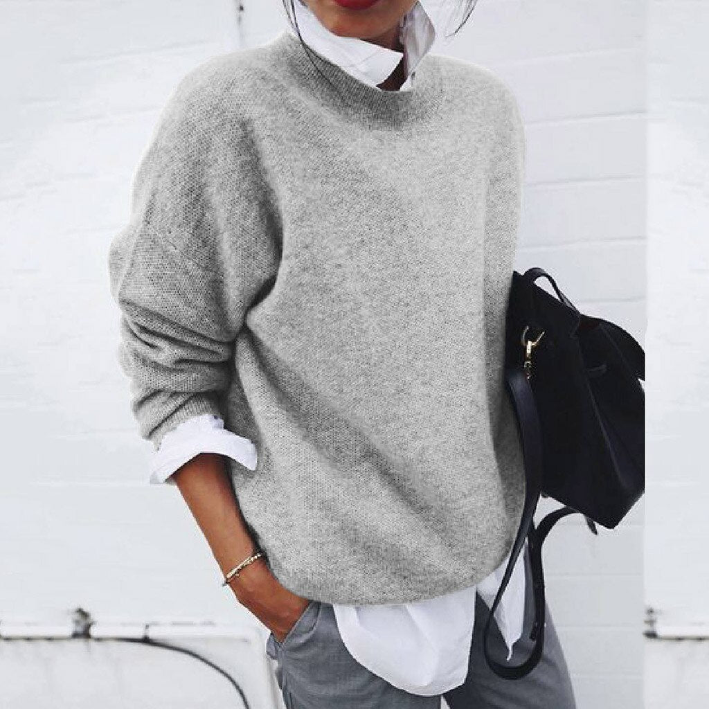 "Women's soft cashmere sweater, plush fabric, flattering fit, versatile style, shown in khaki, ideal for adding chic comfort.