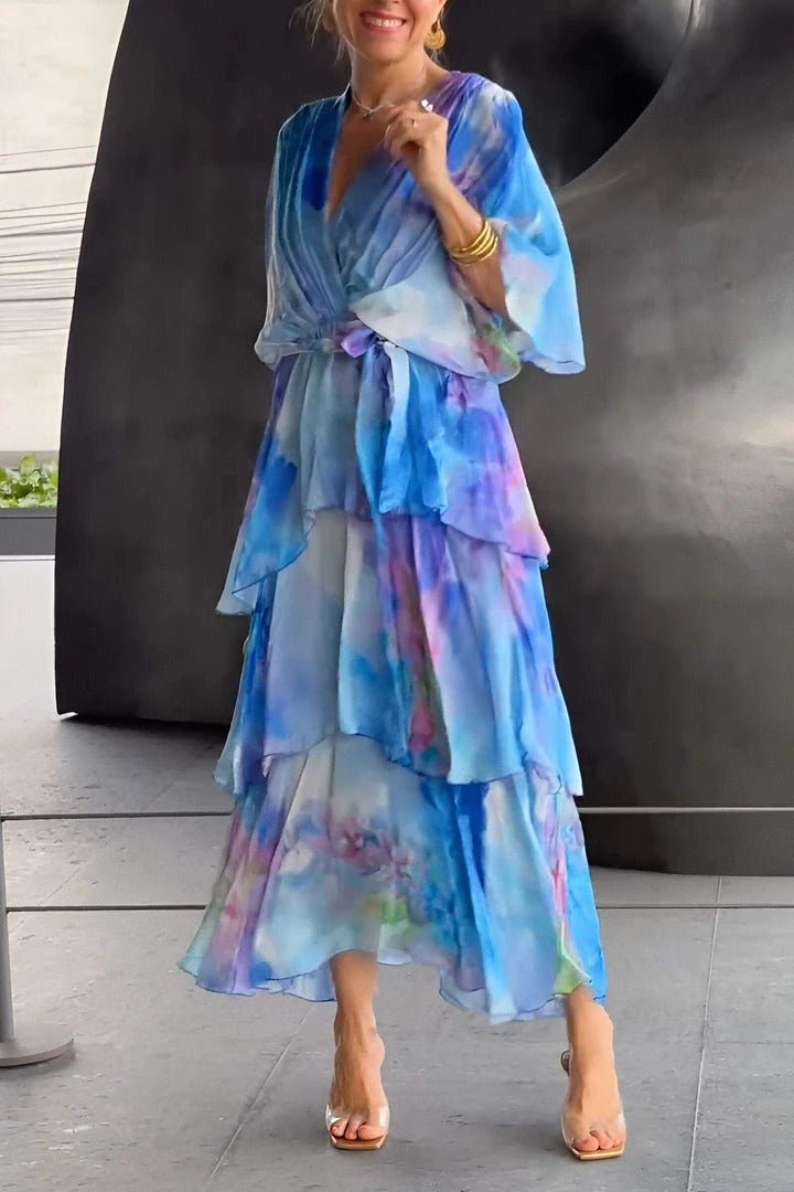 "Women's vibrant multi-colour maxi dress, flowing silhouette, side view highlighting elegant, colorful fabric design."