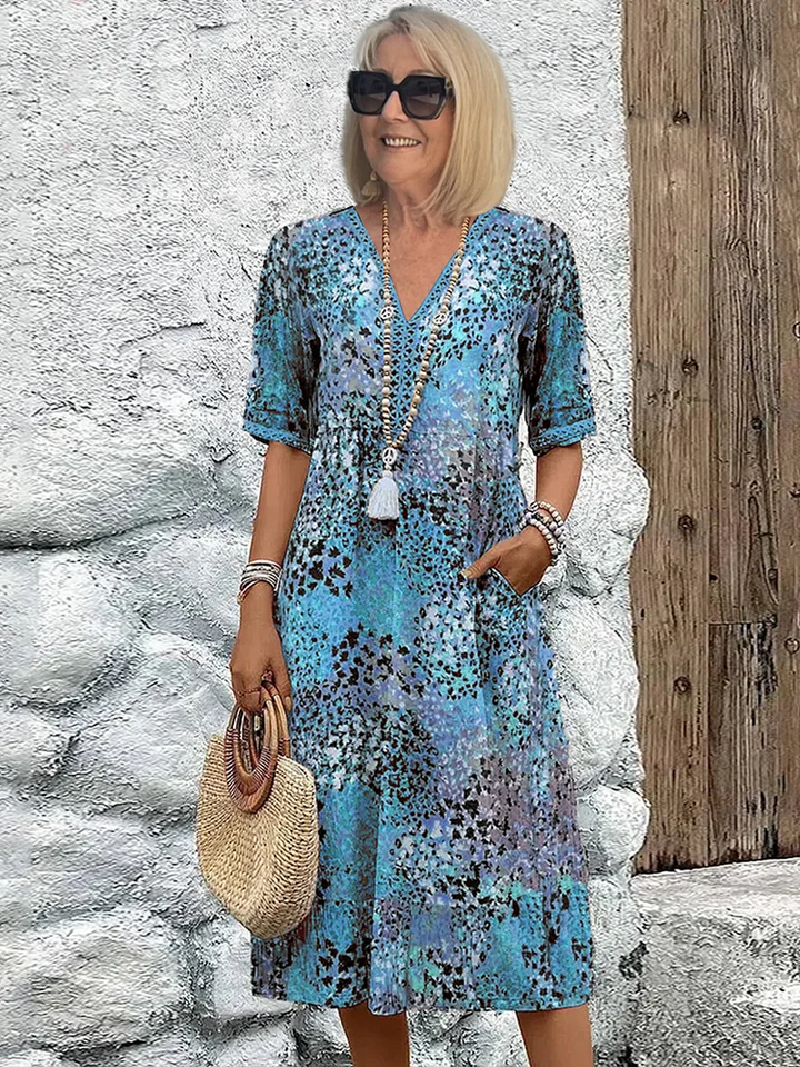 "Women's vibrant summer midi dress in blush pink, lavender, ocean blue, sandy beige, and scarlet red with a breezy fit."