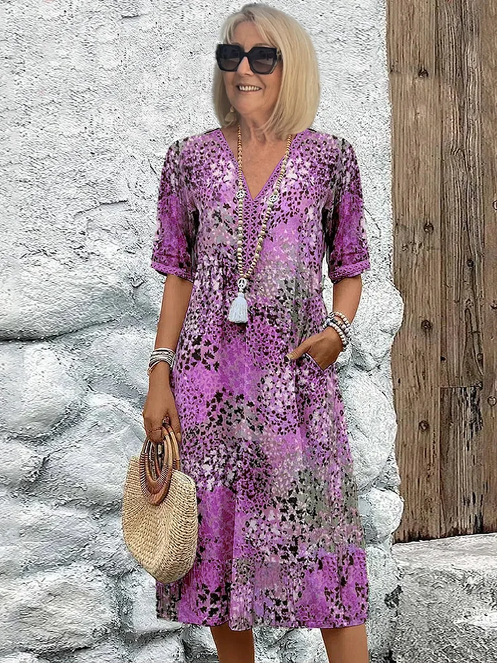 "Women's vibrant summer midi dress in blush pink, lavender, ocean blue, sandy beige, and scarlet red with a breezy fit."