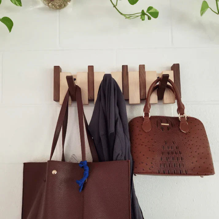 "Wooden piano coat rack with elegant piano-key design, made from beech and walnut wood, stylish home decor and organizer."