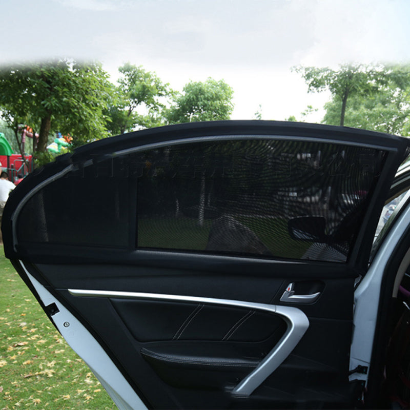 Close-up of a universal car side window sun shade, black mesh, providing sun blocking for travel.