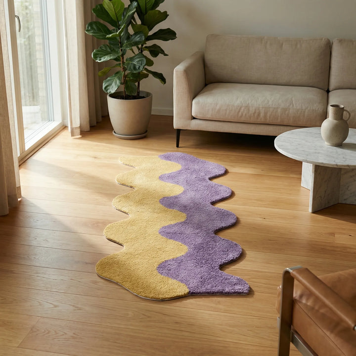 Flowique statement area rug. Abstract color block with wavy design, a modern home accent for any contemporary space.