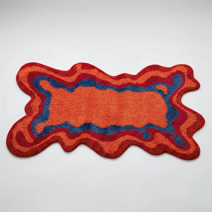 Contemporary sculpted area rug with abstract wave pattern. Ideal for modern home living room or bedroom decor.
