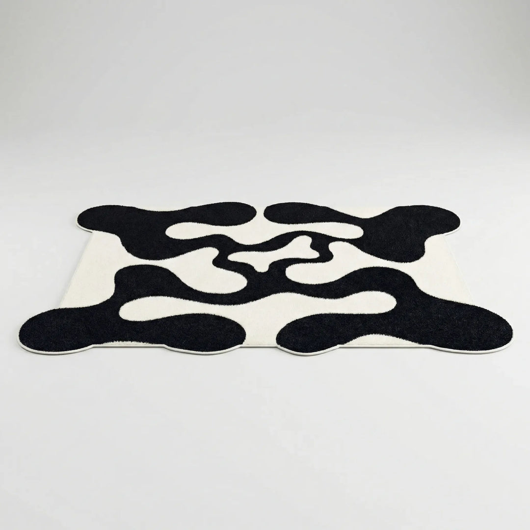 Modern waves abstract area rug, Flowique, contemporary design adds a stylish floor accent to any living room or home decor.