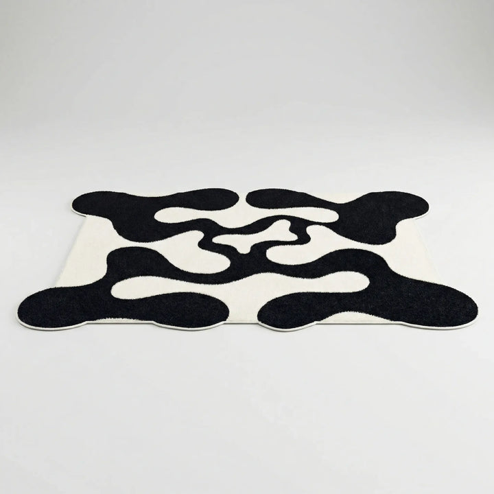 Modern waves abstract area rug, Flowique, contemporary design adds a stylish floor accent to any living room or home decor.