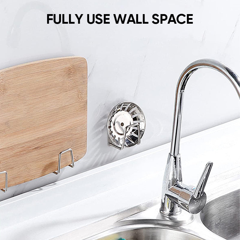 Empty adhesive stainless steel sponge holder, showcasing its drainer design for kitchen use