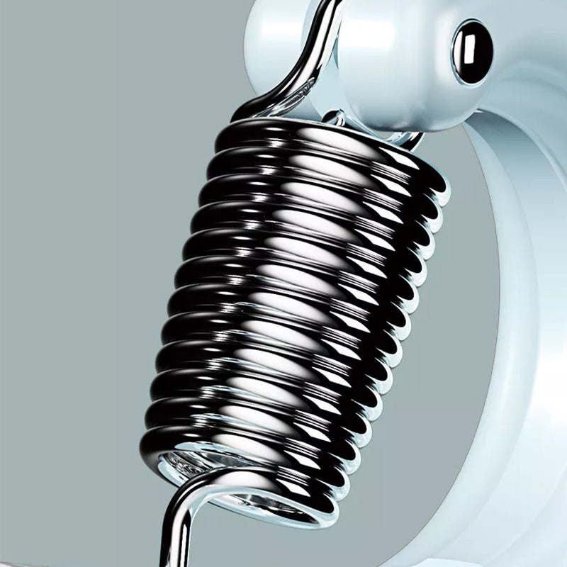 Detailed view of the spring mechanism on a grip strengthener, highlighting durability