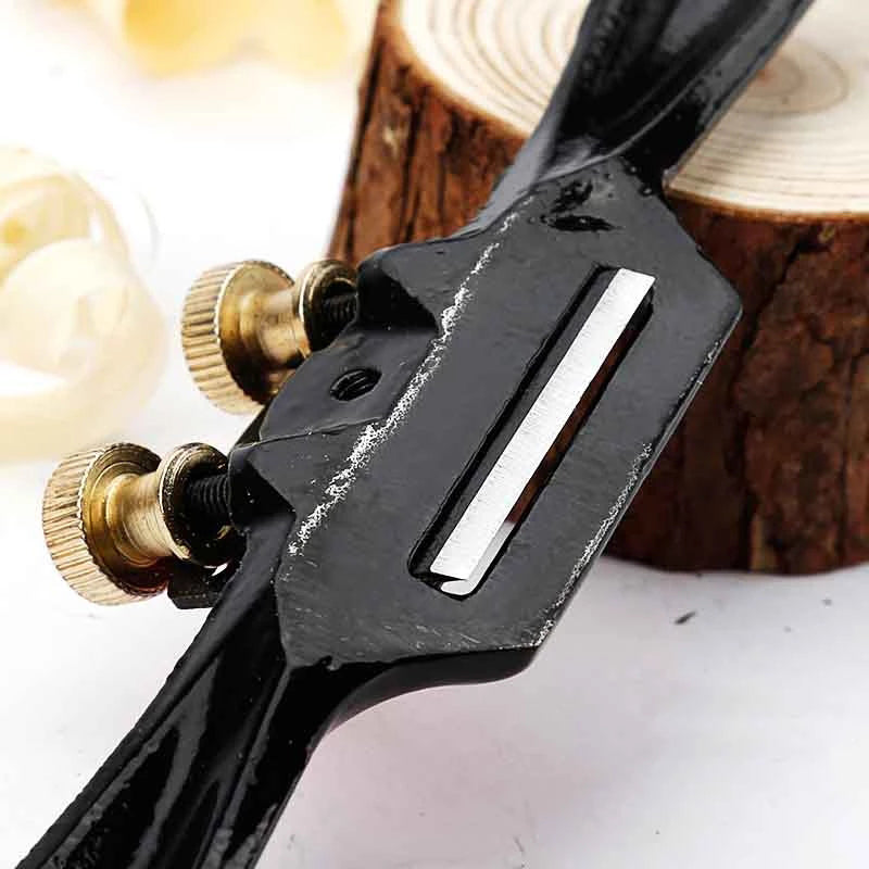 Set of woodworking tools featuring an adjustable hand planer, essential for craft and carpentry work.