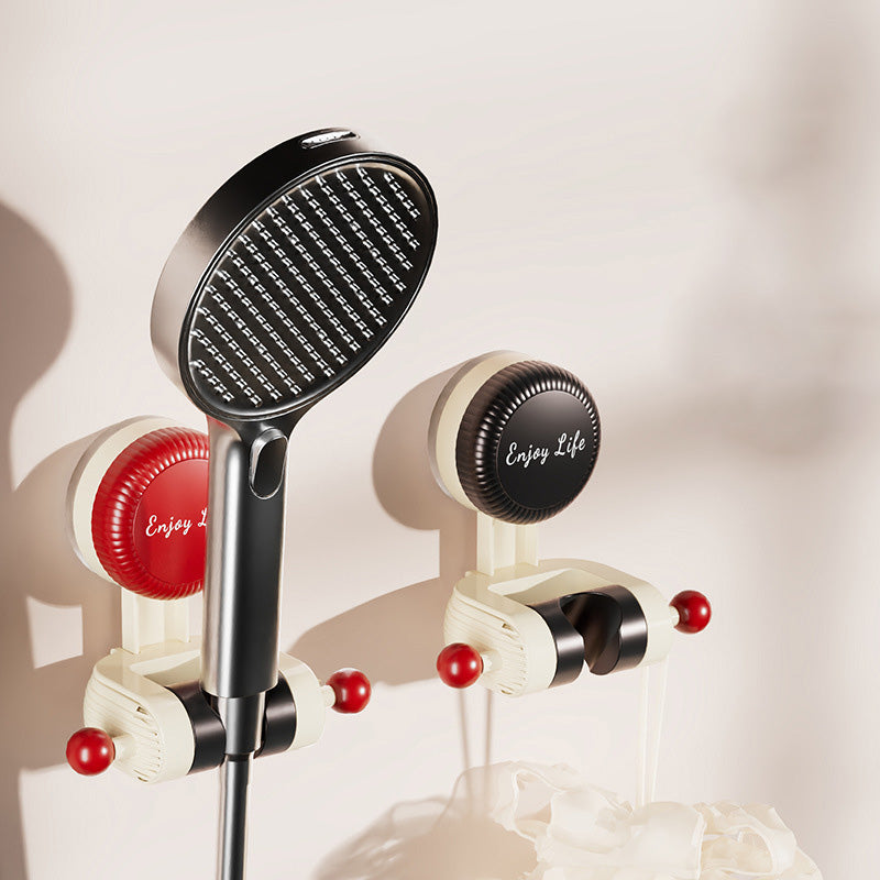Hands installing a drill-free adjustable shower head holder on a smooth shower surface