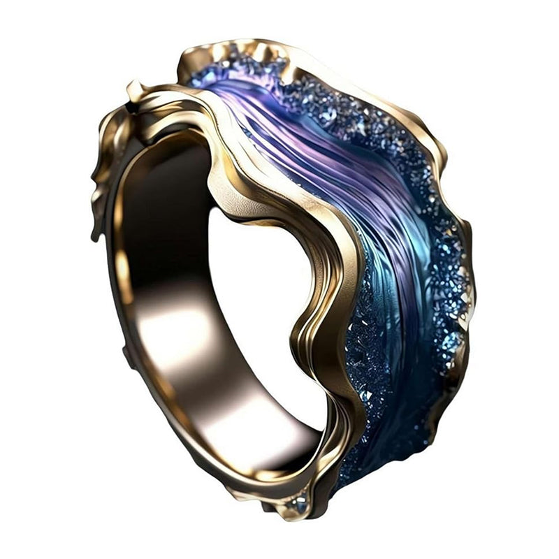Collection of adjustable ocean wave rings, displaying their uniform design and varying resin patterns