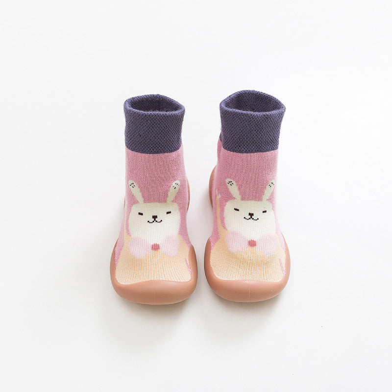Unisex non-slip sock shoes with a vibrant cartoon design, great for growing toddlers